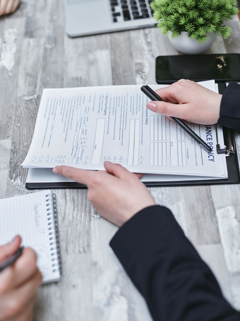 Person reviewing compliance documents